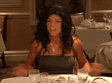 Teresa Giudice flipping a table