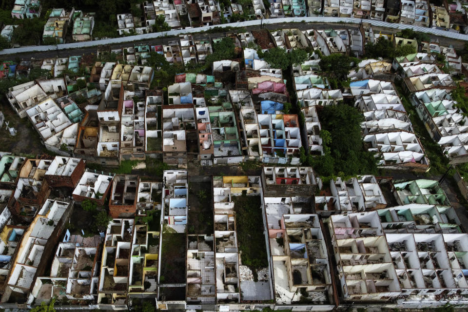 FILE - Homes stand abandoned because of the threat of ground subsidence caused by the Braskem mine in Maceio, Alagoas state, Brazil, Brazil 6, 2022. A Brazilian petrochemical company said Friday, July 21, 2023 that it had reached a $355 million settlement with the coastal city where four decades of Braskem's rock salt mining destroyed five urban neighborhoods and displaced tens of thousands of people. (AP Photo/Eraldo Peres, File)