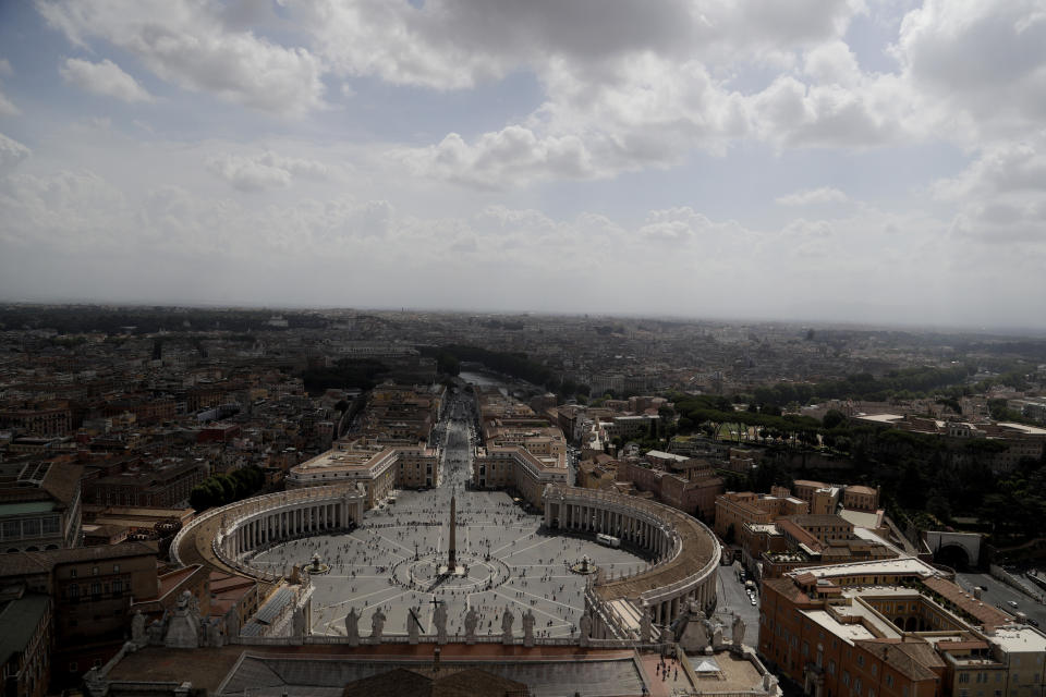 FILE - Clouds hang up in the sky over St. Peter's Square at the Vatican, Wednesday, July 10, 2019. Pope Francis’ chief of staff became one of the highest-ranking Holy See officials to testify in a foreign court Thursday, July 4, 2024, giving a British tribunal a detailed explanation of the negotiations at the heart of the Vatican’s so-called “trial of the century” and pointing a finger at his onetime deputy who escaped the scandal unscathed. (AP Photo/Gregorio Borgia, File)