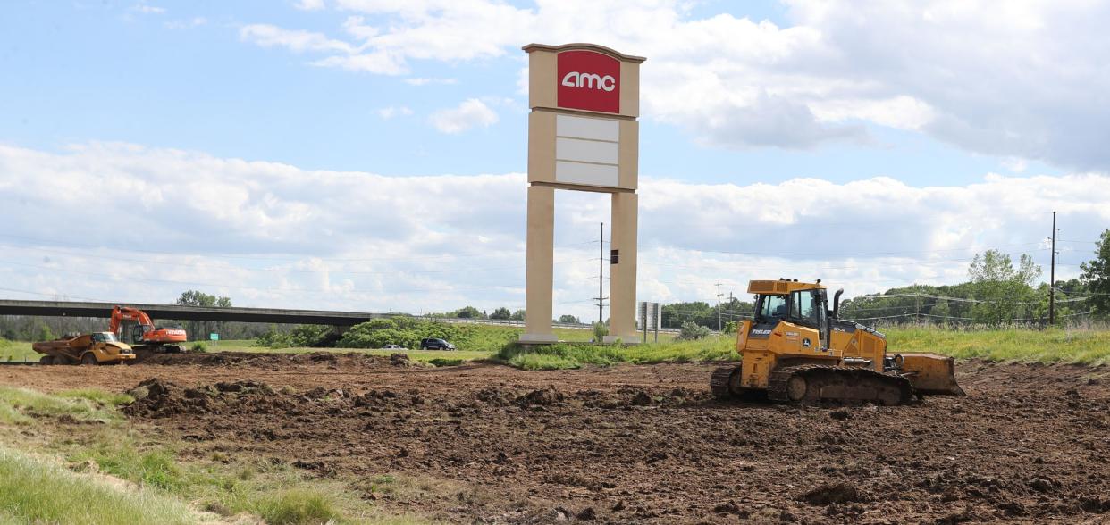 Construction crews are working on a lot on South 44th Street near the AMC Theater as seen, Wednesday, June 26, 2024, in Manitowoc, Wis.