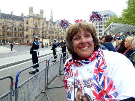 FILE PHOTO: Donna Werner waits outside Westminster Abbey for the wedding of Prince William and Kate Middleton in London, Britain, April 29, 2011. Anita Atkinson/Handout via REUTERS
