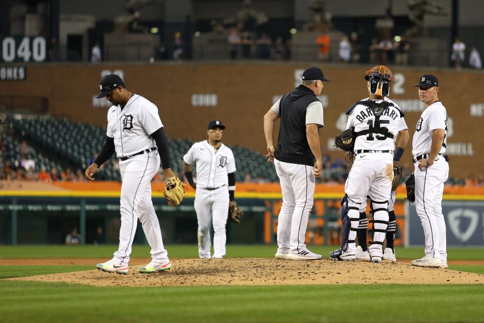 Tigers pitcher Rony Garcia, left, leaves the game in the fifth inning while playing the White Sox on Monday, June 13, 2022, Comerica Park.
