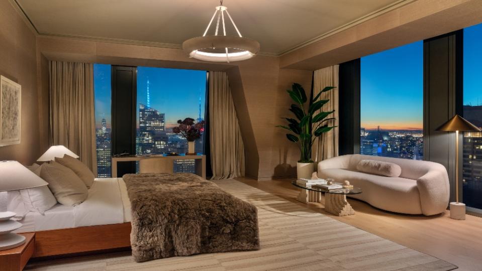 Master bedroom suite with views of city skyline - Credit: Evan Joseph Images/53 West 53