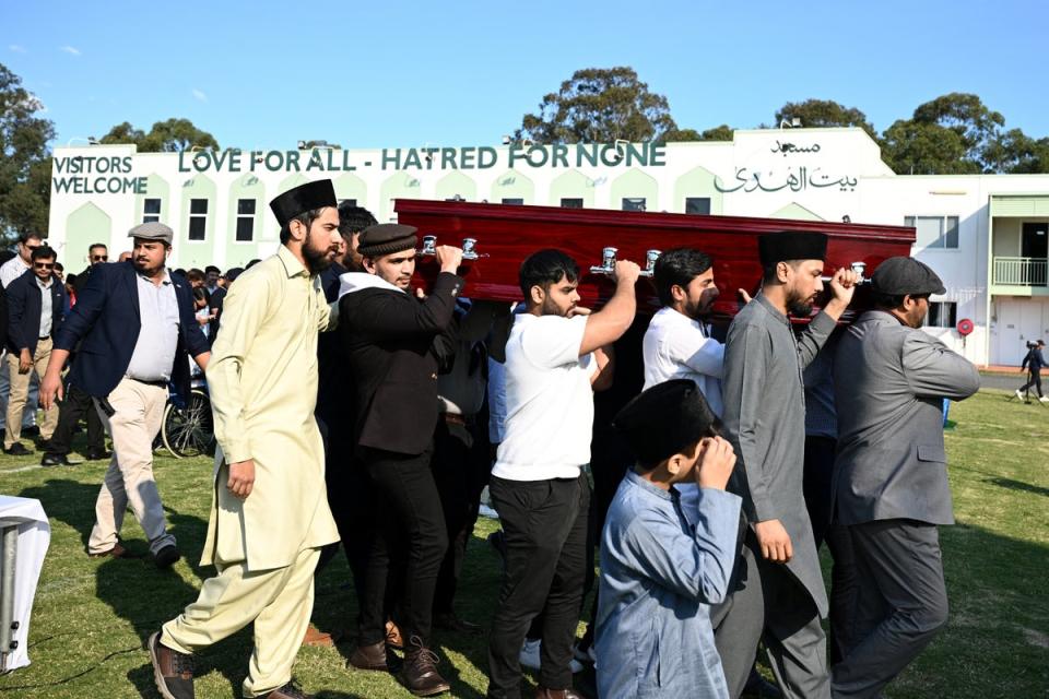 A casket is carried during the funeral for Faraz Tahir at Masjid Baitul Huda mosque in Sydney, Australia (Reuters)