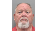 This Henderson Detention Center photo shows Richard John Devries following his arrest and booking on Monday, May 30, 2022, on felony attempted murder, battery and weapon charges in a shooting on a Las Vegas-area freeway. Police say Devries is president of the Las Vegas charter of the Hells Angels motorcycle club. Authorities say at least seven people were wounded or injured, including at least six members of the rival Vagos motorcycle club in the Sunday, May 29, 2022, shooting on U.S. 95 between Boulder City and Las Vegas. (Henderson Police Department via AP)