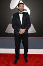 <b>Drake</b><br> <b>Grade: B</b><br> The “Take Care” rapper looked dapper in a navy jacket with black lapels and a bow tie. Do you like his different take on a typical tux?