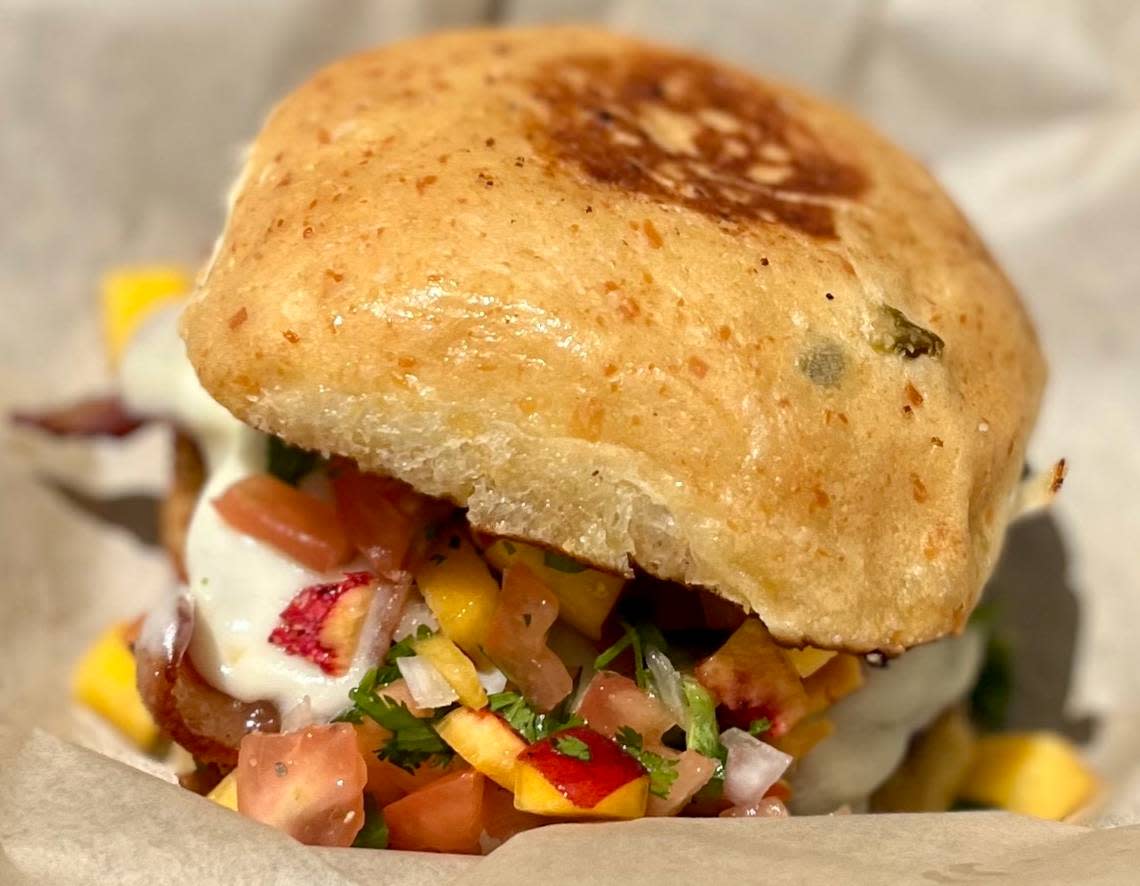 A Parker County peach pico-de-gallo burger at JD’s Hamburgers.