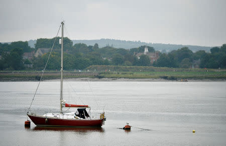 A moored sailing boat is seen on the River Medway in Chatham, Britain, August 8, 2017. REUTERS/Hannah McKay