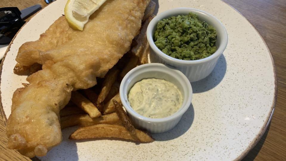 Eastern Daily Press: Adnams beer-battered haddock and chips from The White Horse Picture: Stuart Anderson