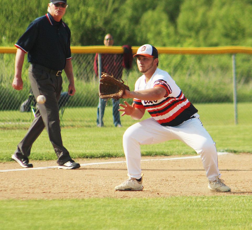 Pontiac third baseman Parker Francis fields a the ball and made the play in what became Pontiac's 9-1 win over Tremont for the Class 2A Olympia Regional title Monday.