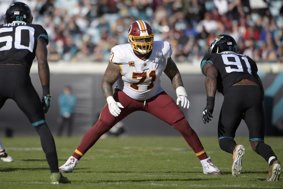 Washington left tackle Trent Williams, shown here last December, could not comfortably wear a helmet during his team physical. (AP/Phelan M. Ebenhack)