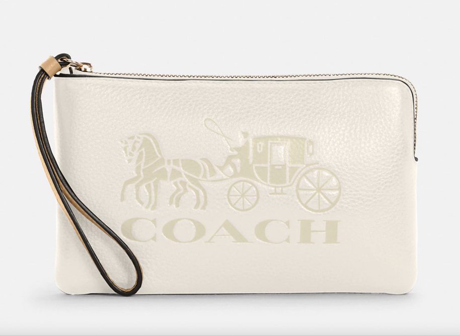 I'm a shopping editor and I'm buying this $23 Coach Outlet wristlet for  Christmas