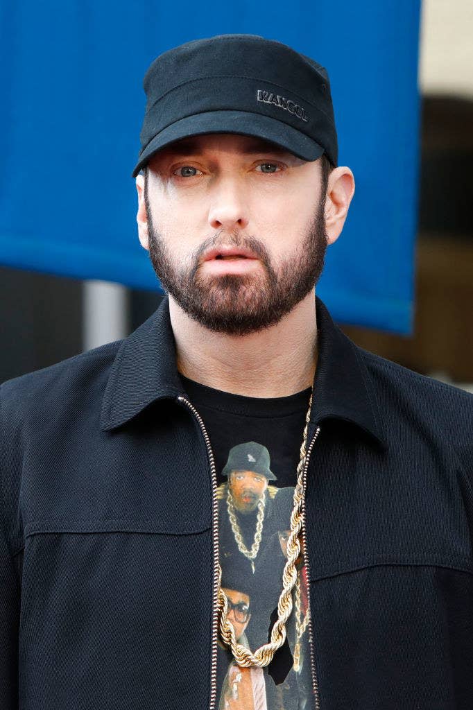 Eminem wearing a cap at 50 Cent's Hollywood Walk of Fame ceremony in 2020
