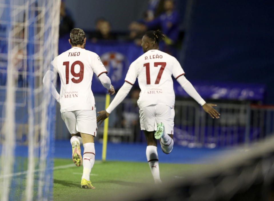 AC Milan's Rafael Leao, right, celebrates after scoring his side's second goal during the Champions League Group E soccer match between Dinamo Zagreb and AC Milan in Zagreb, Croatia, Tuesday, Oct. 25, 2022. (AP Photo)