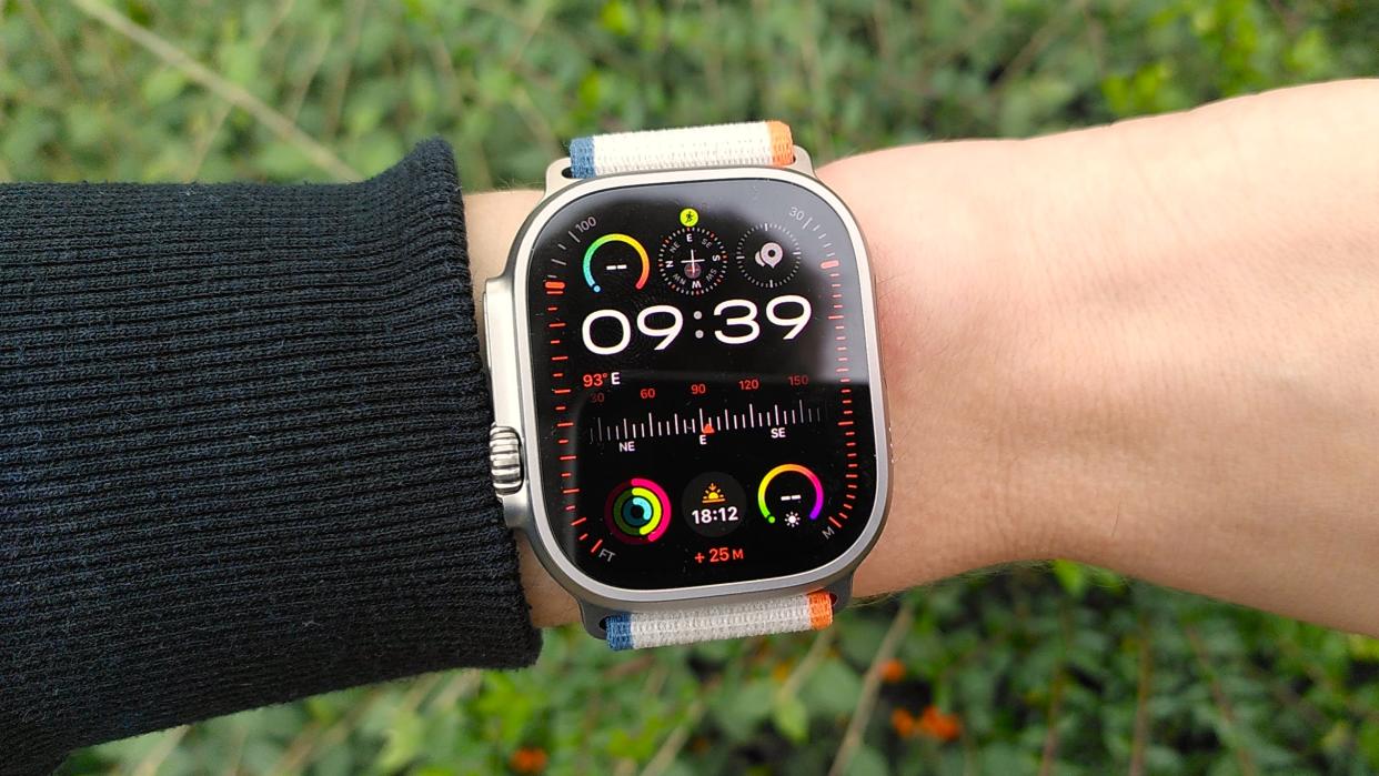  Woman's wrist wearing Apple Watch Ultra 2. 