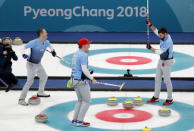 Curling - Pyeongchang 2018 Winter Olympics - Men's Final - Sweden v U.S. - Gangneung Curling Center - Gangneung, South Korea - February 24, 2018 - Vice-skip Tyler George of the U.S., second Matt Hamilton of the U.S. and lead John Landsteiner of the U.S. celebrate after winning the match. REUTERS/Cathal McNaughton