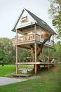 <p>With its <a href="https://www.countryliving.com/outdoor/outdoor-living/adult-summer-camps#category1-1" rel="nofollow noopener" target="_blank" data-ylk="slk:1920s cabins;elm:context_link;itc:0;sec:content-canvas" class="link ">1920s cabins</a> and vintage Boy Scout tents, <a href="http://www.wandawega.com/" rel="nofollow noopener" target="_blank" data-ylk="slk:Camp Wandawega;elm:context_link;itc:0;sec:content-canvas" class="link ">Camp Wandawega</a>, located in Elkhorn, Wisconsin, evokes the set of Wes Anderson's <em>Moonrise Kingdom. </em>But the camp's most charming feature is its three-level treehouse, built around a massive elm tree and outfitted with Pendleton blankets, tree swings, and Mason jar light fixtures. Used as a common space, guests can read a book in the treehouse's library on a rainy day or spend a lazy afternoon on the bottom-level hammock. </p><p><a class="link " href="http://www.wandawega.com/tour/treehouse/" rel="nofollow noopener" target="_blank" data-ylk="slk:SEE INSIDE;elm:context_link;itc:0;sec:content-canvas">SEE INSIDE</a></p>