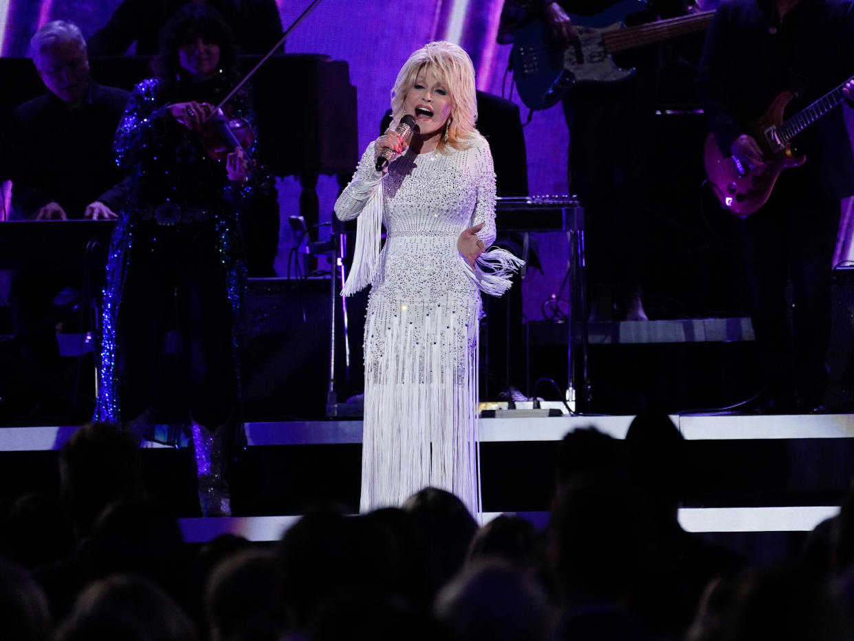 NASHVILLE, TENNESSEE - NOVEMBER 13:  (FOR EDITORIAL USE ONLY)  Dolly Parton performs onstage at the 53rd annual CMA Awards at the Bridgestone Arena on November 13, 2019 in Nashville, Tennessee. (Photo by Mickey Bernal/WireImage)