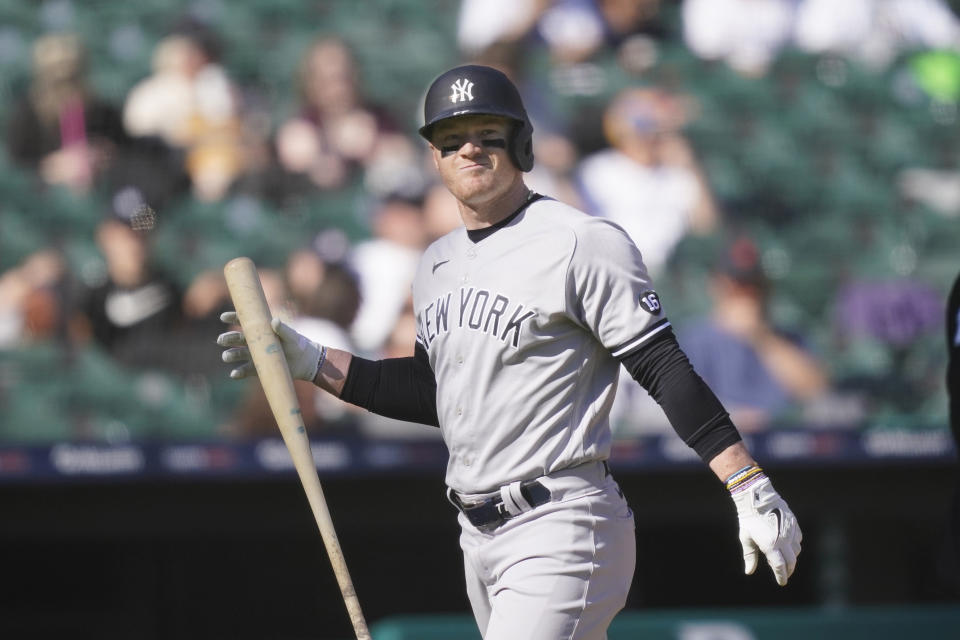 New York Yankees' Clint Frazier walks back to the dugout after striking out during the fifth inning of a baseball game against the Detroit Tigers, Saturday, May 29, 2021, in Detroit. (AP Photo/Carlos Osorio)
