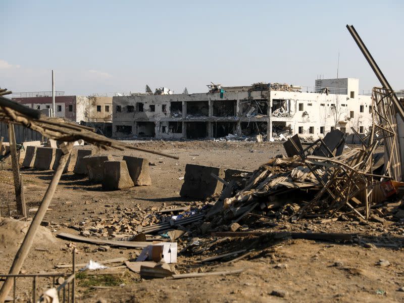 A damaged hospital is seen at the site of an attack in a U.S. military air base in Bagram