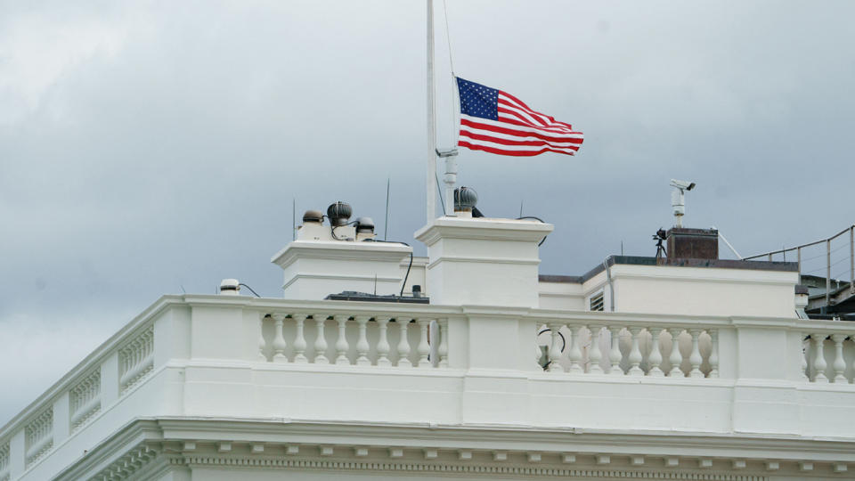 The flag above the White House flies at half staff in honor of the Indianapolis, Indiana shooting victims, in Washington, DC on April 16, 2021. (Mandel Ngan/AFP via Getty Images)