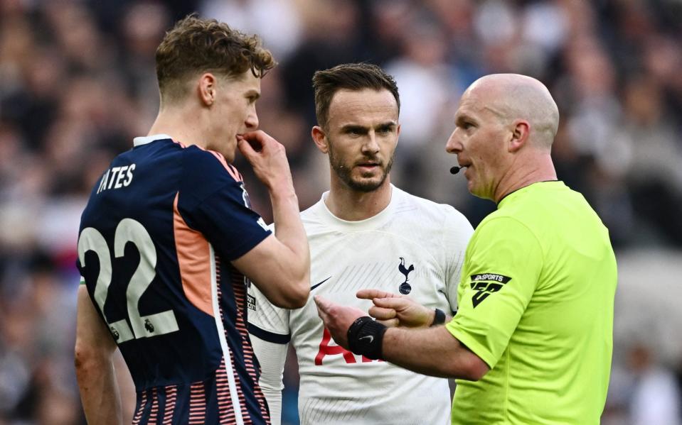 James Maddison and Ryan Yates in conversation with referee Simon Hooper