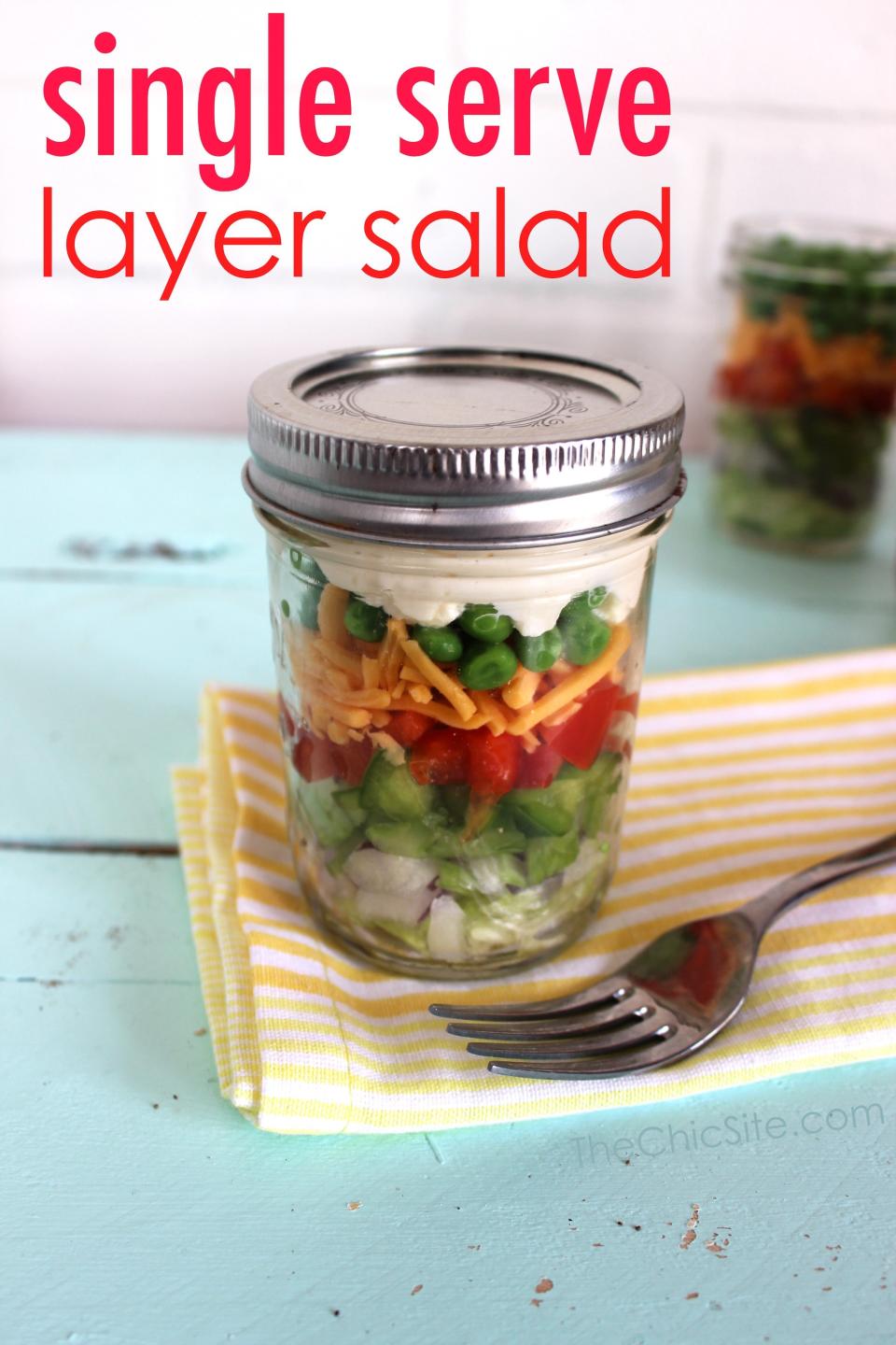 <strong>Get the <a href="http://thechicsite.com/2014/04/11/layer-salad-in-a-mason-jar/" target="_blank">Single Serve Layer Salad In A Jar</a> recipe from The Chic Table</strong>