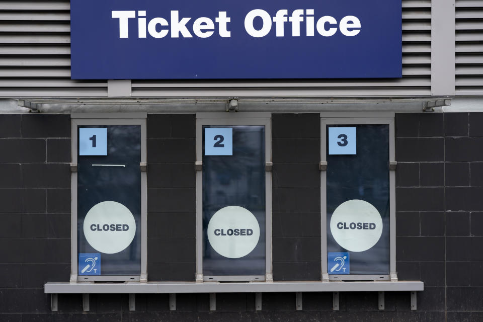 FILE - In this March 14, 2020, file photo, a closed ticket office is shown at Etihad Stadium where Manchester City were due to play Burnley in an English Premier League soccer match, in Manchester, England. Many professional sports league, such as the NFL and European soccer leagues, have lucrative television contracts and big-money corporate sponsors that fill their substantial coffers. But the domestic soccer league in the U.S. still relies heavily on ticket sales, merchandising and concessions, much like many university athletic departments, and without games their very ability to make ends meet would stretch the abilities of even the savviest of accountants. (AP Photo/Jon Super, File)