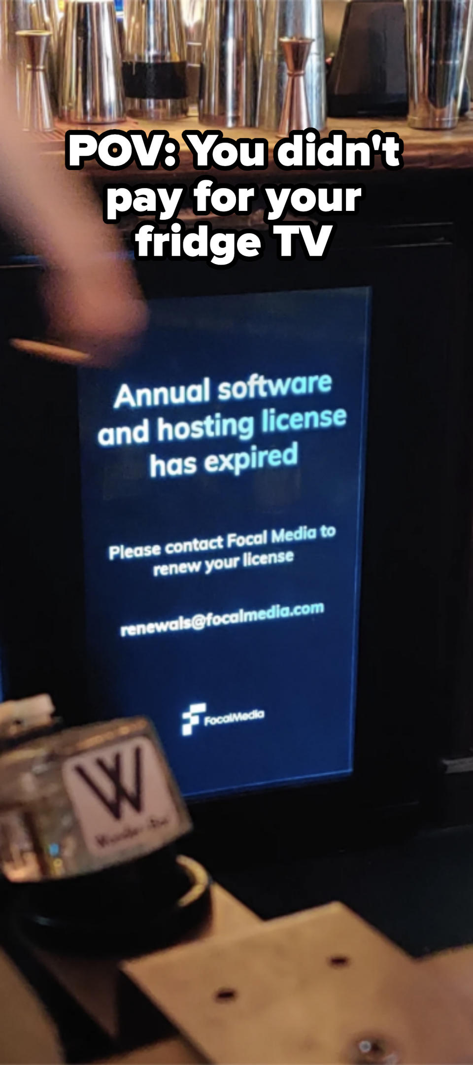 Digital screen reads, "Annual software and hosting license has expired. Please contact Focal Media to renew your license renewals@focalmedia.com."