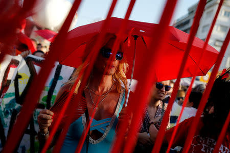 A drag queen takes part in a Gay Pride parade in Athens, Greece June 9, 2018. REUTERS/Costas Baltas