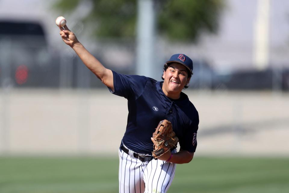 Javy Vasquez (33) of La Quinta High pitches to Heritage during a playoff game against Heritage of Menifee in La Quinta, Calif., on Thursday, May 2, 2024.
