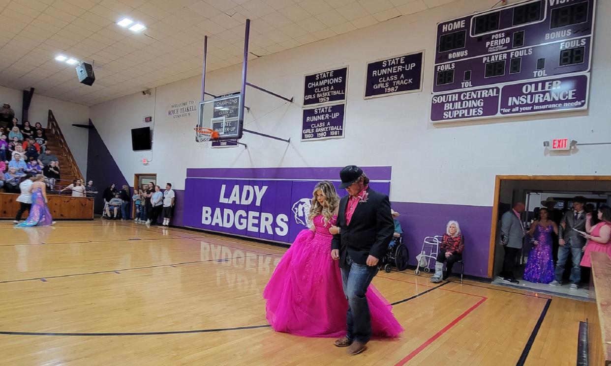 Elmore City-Pernell High School students participate in the annual promenade in the school gym before their Junior/Senior Prom on April 12 in Elmore City, Oklahoma.