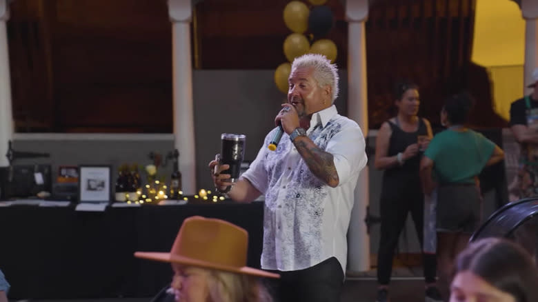 Guy Fieri talking at fundraiser