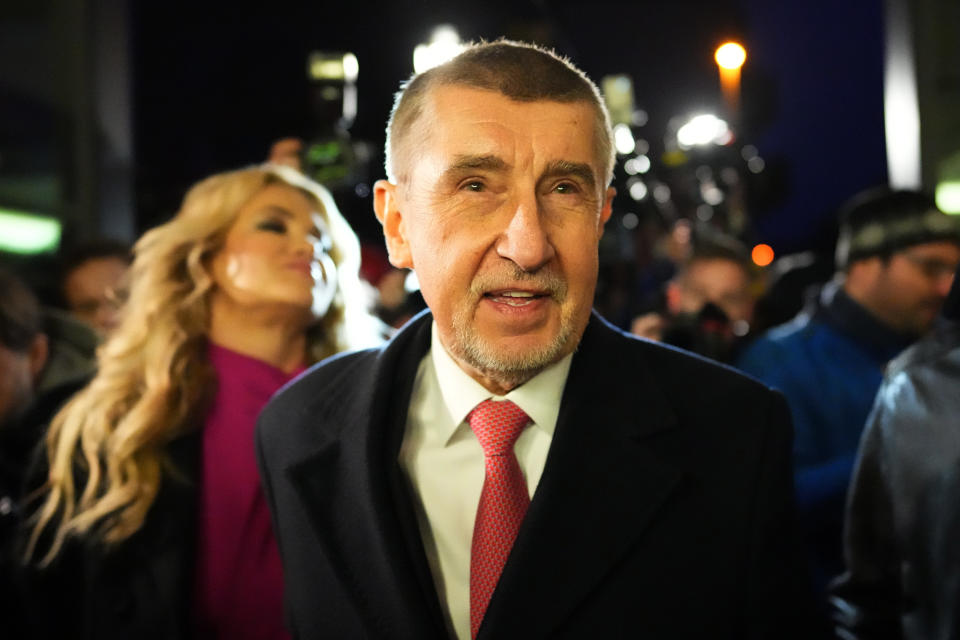 Presidential candidate Andrej Babis accompanied with his wife Monika arrives to address media after the preliminary results for the first round of presidential election in Prague, Czech Republic, Saturday, Jan. 14, 2023. (AP Photo/Petr David Josek)