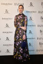 <p>The statuesque model stunned in a black floral Erdem gown and Roksanda bag.<br><i>[Photo: Getty]</i> </p>