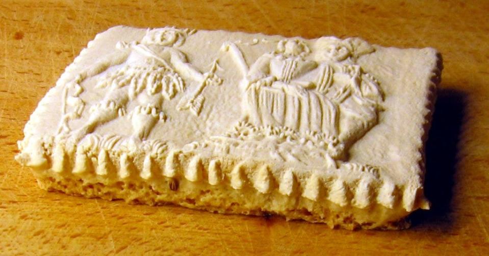Springerle is a type of South German biscuit or cookie with an embossed design made by pressing a mold onto rolled dough and allowing the impression to dry before baking.