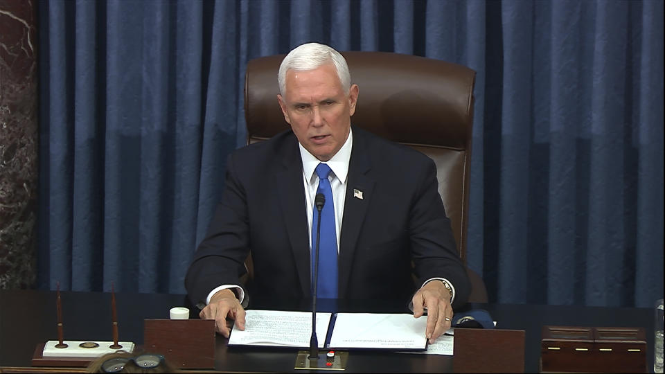 In this image from video, Vice President Mike Pence speaks as the Senate reconvenes after protesters stormed into the U.S. Capitol on Wednesday, Jan. 6, 2021. (Senate Television via AP)