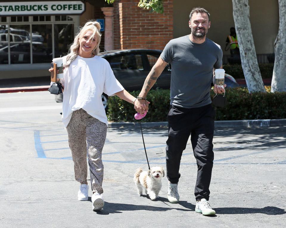 <p>Brian Austin Green and girlfriend Sharma Burgess stop for coffee with their pup in Malibu on June 9.</p>