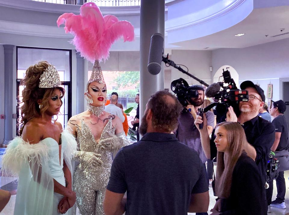 Drag queens Priyanka, left, and Sasha Velour, right, debate transgender issues on Thursday, Aug. 3, 2023, with Hannah Faulkner, right, and her father, Tre Faulkner, in the rotunda at Murfreesboro City Hall, after the Faulkners spoke in support of the city's community decency standards ordinance during the public comment City Council meeting. The discussion was being filmed by an HBO crew for the the documentary series "We're Here."