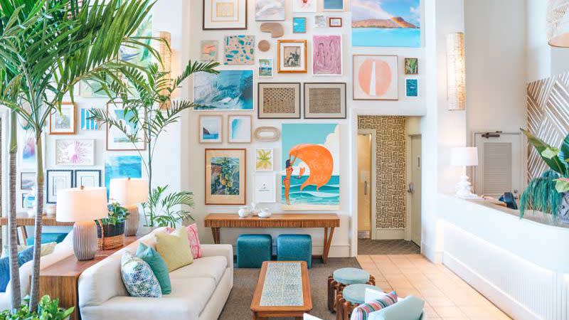 Colorful prints on the wall at the Kaimana Beach Hotel, voted one of the best resorts and hotels in Hawaii