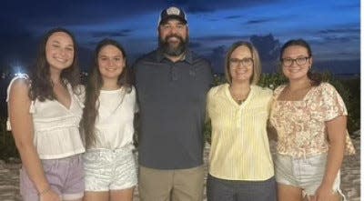 The community has rallied around North Port High athletic director Tony Miller, his wife, Leighann, and twin 17-year-old daughters, Allie and Alexis, after a fire damaged their home.