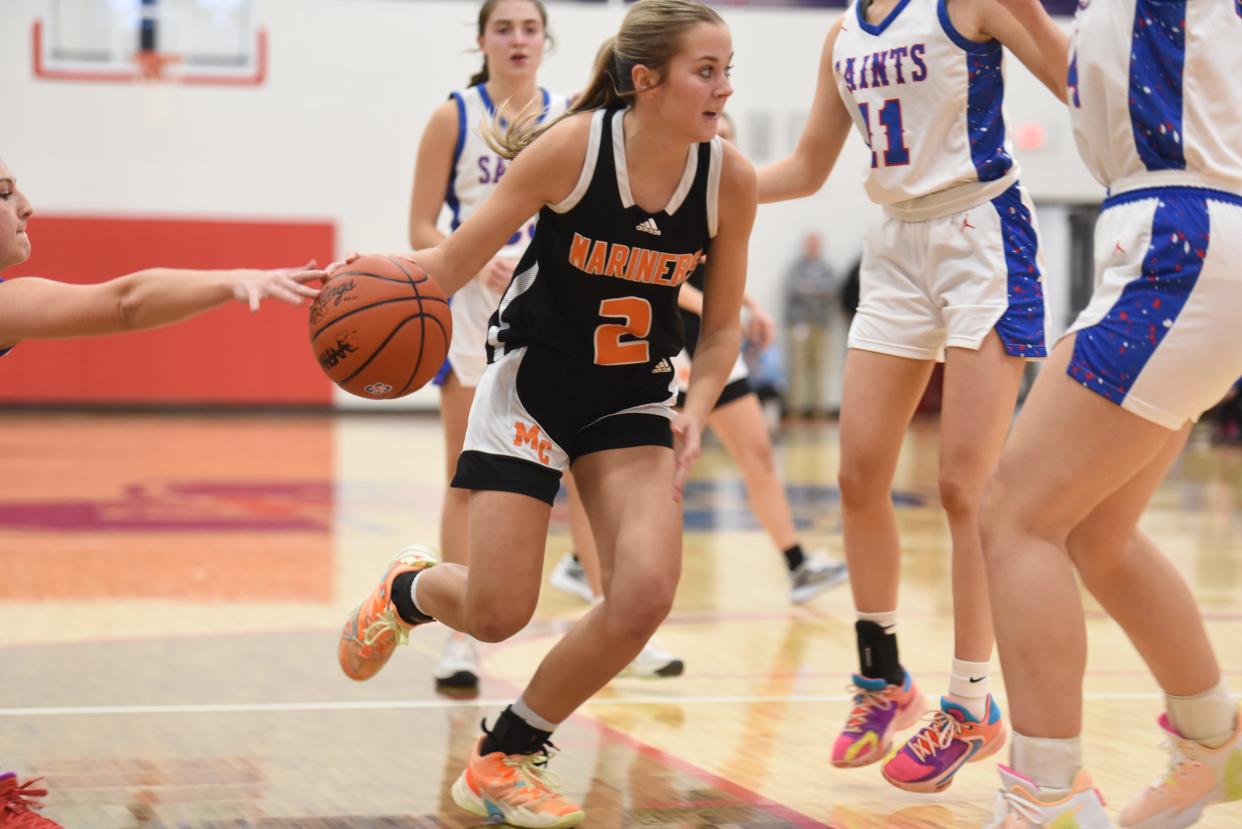 Marine City's Jade Blanchard drives the lane during a girls basketball game against St. Clair at St. Clair High School on Tuesday, Jan. 9, 2024.