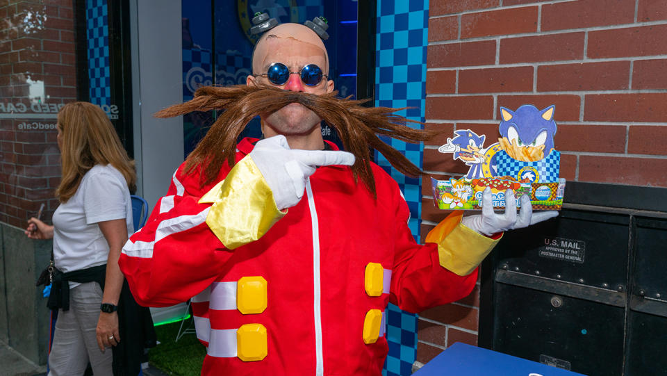 Cosplayer as Dr Robotnik dines outside the Sonic Speed Cafe at Comic-Con on July 22, 2023 in San Diego