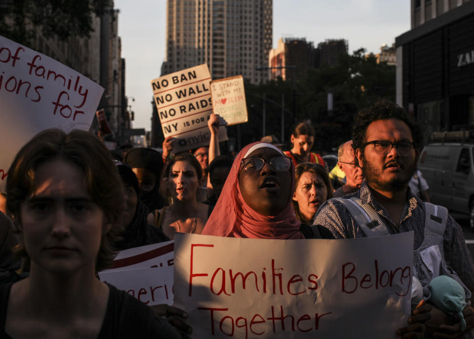 <p>Protesters march down Broadway after a rally was held outside of Manhattan Federal Court on June 26, 2018 in New York City. (Photo: Byron Smith/Getty Images) </p>