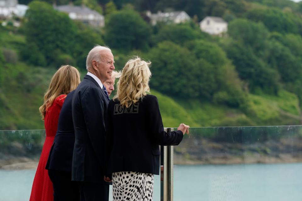 President Joe Biden and first lady Jill Biden are greeted by British Prime Minister Boris Johnson and his wife Carrie Johnson, ahead of the G-7 summit in Cornwall, June 10, 2021, in Carbis Bay, England.