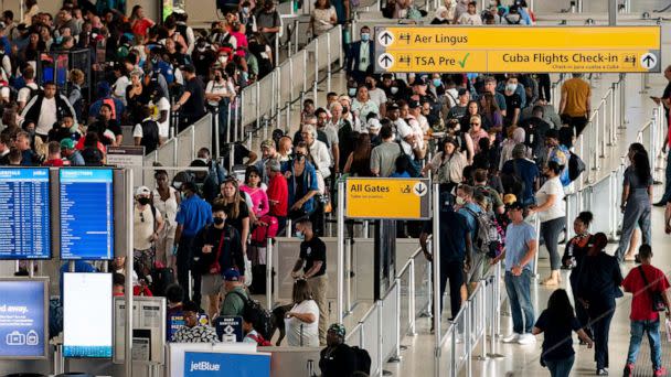 PHOTO: In this June 28, 2022, file photo, people wait in a TSA line at the John F. Kennedy International Airport in New York. (Julia Nikhinson/AP, FILE)