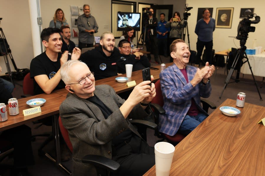 TOPSHOT – Andy Szilagyi, VP Engineering (L) and Markus Rufer, President and CEO of Scorpius, watch a live feed as the Spacecraft Odysseus lands on the moon from Scorpius Space Launch Company in Torrance, California, on February 22, 2024. The Intuitive Machines Nova-C class lunar lander, powered by SSLC propellant tanks, is bound for the moon, where it will attempt to land near the south pole on February 22 and carry out experiments that pave the way for the return of US astronauts later this decade. (Photo by David SWANSON / AFP) (Photo by DAVID SWANSON/AFP via Getty Images)