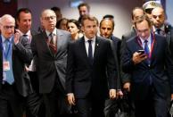 French President Emmanuel Macron arrives to attend a bilateral meeting with Germany's Chancellor Angela Merkel (unseen) during a European Union leaders summit meeting in Brussels, Belgium October 19, 2017. REUTERS/Francois Lenoir