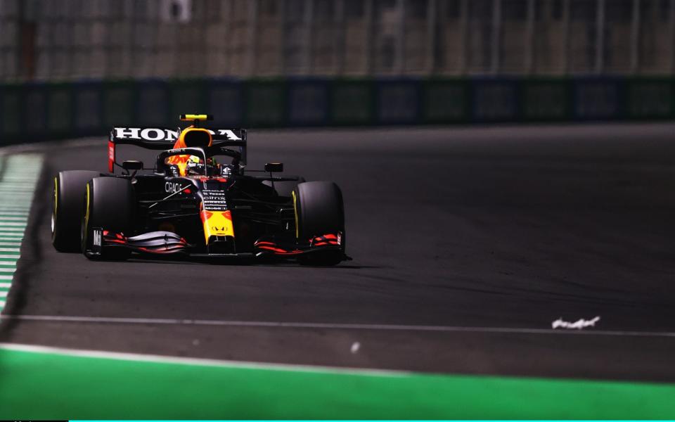 Sergio Perez of Mexico driving the (11) Red Bull Racing RB16B Honda during the F1 Grand Prix of Saudi Arabia at Jeddah Corniche Circuit on December 05, 2021 in Jeddah, Saudi Arabia -  Lars Baron/Getty Images