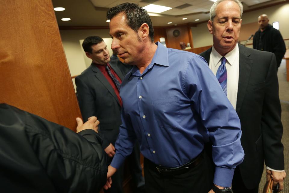 William Melendez leaves the courtroom followed by his lawyer David Lee after being arraigned in 22nd District Court in Inkster on Tuesday, April 21, 2015.